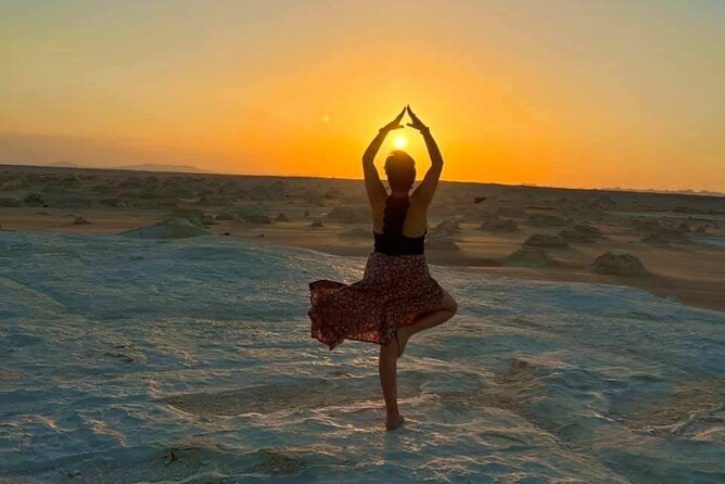 2Days to White Desert and Bahariya Oasis tour From Cairo & Giza - Black Desert: dark hills above golden sand