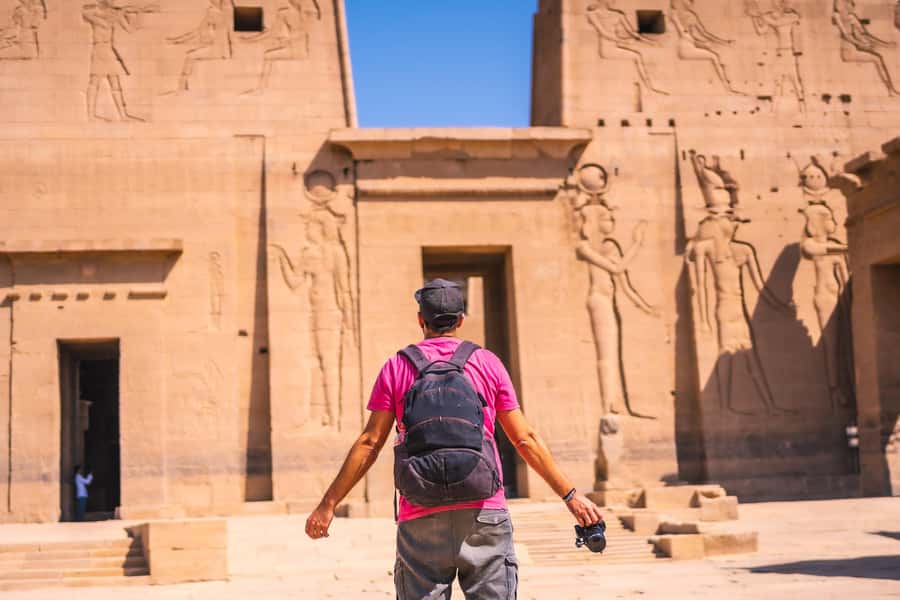 Aswan: Philae Temple Guided Half-Day Group Tour - Entering a temple devoted to Isis