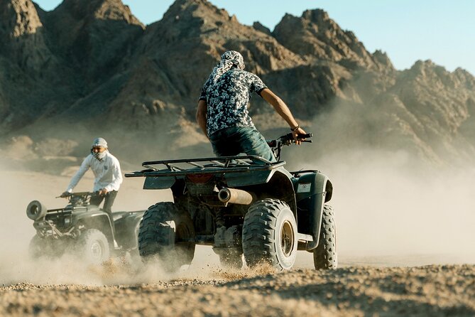 ATV Quad Bike Desert Adventure & Camel Ride from Hurghada - Quad biking beneath the Red Sea mountains