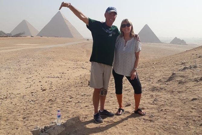 Best Two-Day Private Guided City Tour of Cairo Giza and Saqqara - Day 1 at Giza: three pyramids, the Sphinx, and a camel ride