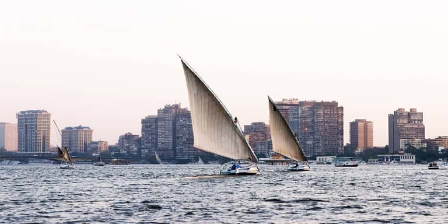 Cairo: Felucca ride on The Nile River with Meals - Eating an Egyptian meal beside the Nile