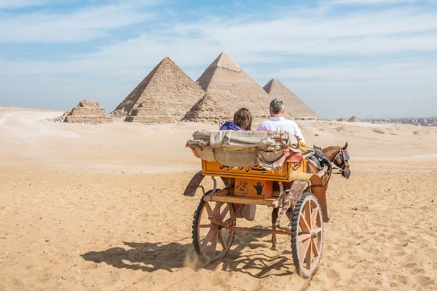 Cairo: Half Day Pyramids Tour by Camel or Horse Carriage - Choosing between a camel and a horse carriage