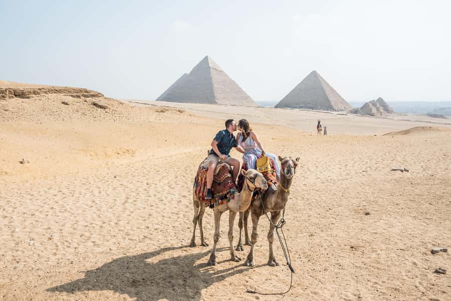 Cairo: Private Half-Day Pyramids Tour with Photographer - The camel ride around the pyramids