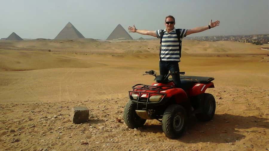 Cairo: Private Quad Bike Desert Tour with Pyramids & Sunset - Photos and the view back to Cairo