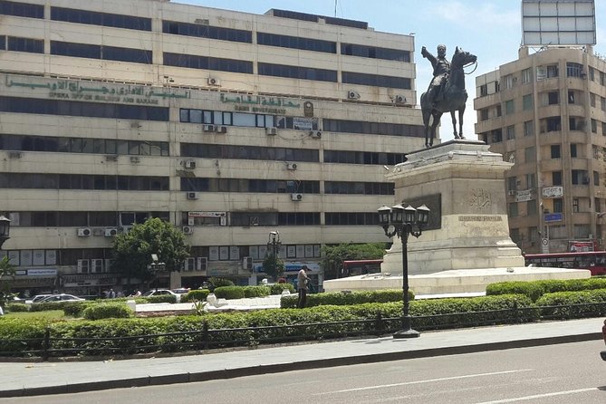 Downtown Cairo Half-Day Tour with Egyptian Dinner - Tahrir’s graffiti and the public memory of revolution