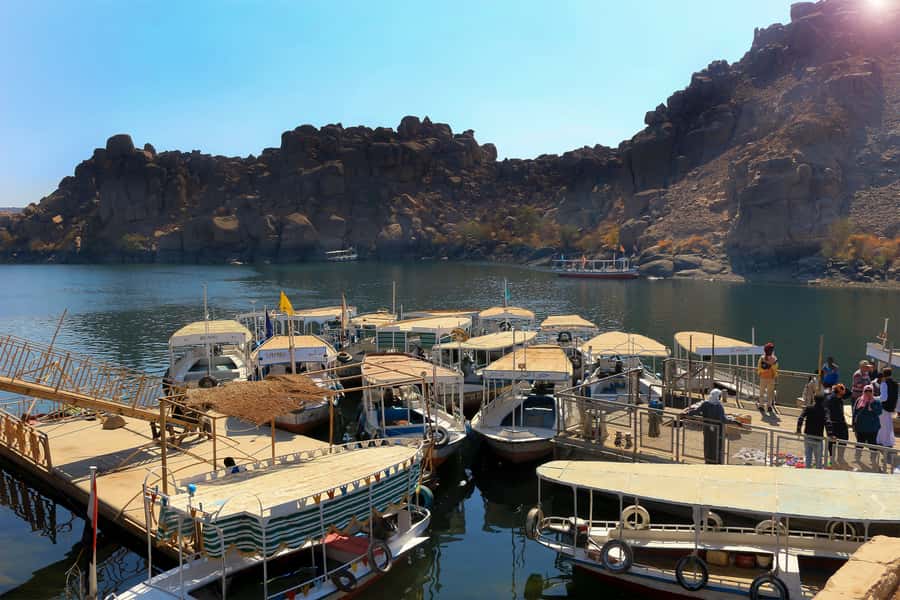 From Aswan: Philae Temple & Motorboat Tour to Nubian Village - Entering the Nubian village near Soheil Island