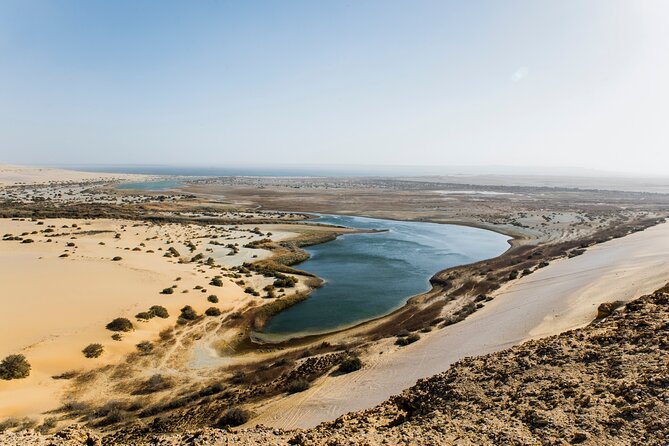 From Cairo: Desert Safari, Waterfalls, Sand boarding and Camel ride with Lunch - Mudawara Mountain and the wide desert view