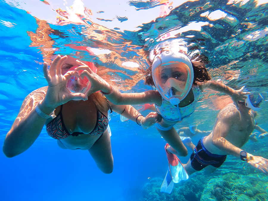From Hurghada: Giftun Island Cruise with Lunch & Watersports - Coral snorkeling stops in open water