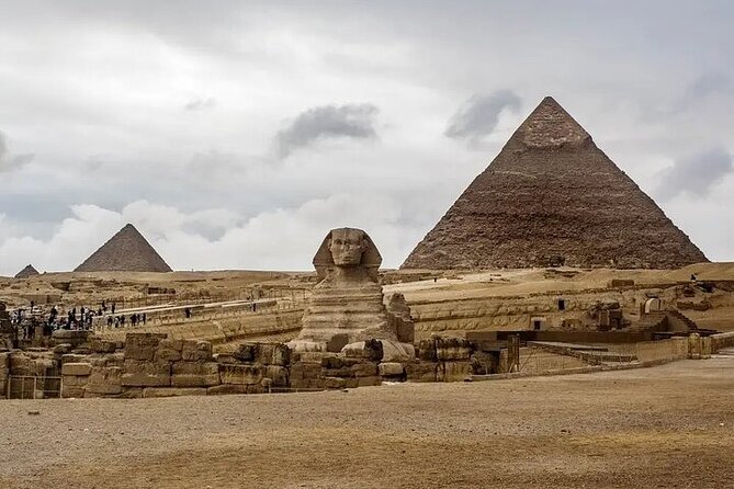 Full-Day Private Tour Giza Pyramids Saqqara and Memphis ( Included BBQ lunch ) - Giza Pyramids: three hours among the headline monuments