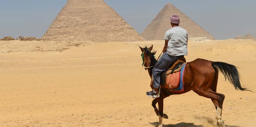 Giza: Arabian Horse Tour Around the Giza Pyramids - Riding toward the pyramids from the Giza desert