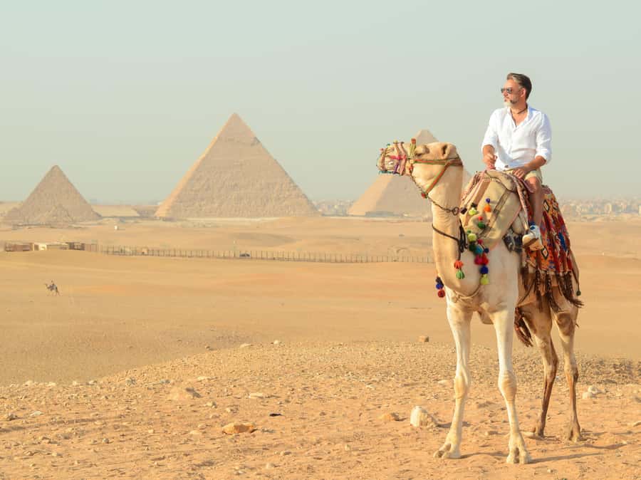 Giza Sunrise Pyramid Guided Tour With Camel Ride & Breakfast - The 8 AM option inside the Giza complex