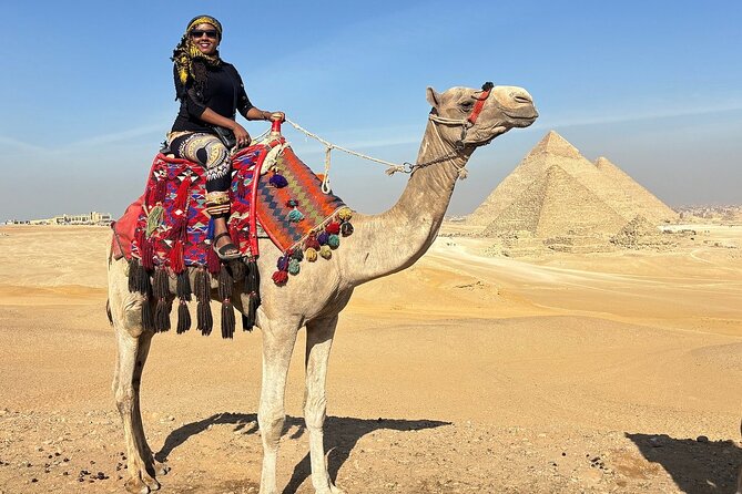 Guided Tour to Giza Pyramids ,Sphinx, Camel & inside the pyramids - The guide can shape the whole morning