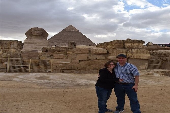 Half day Guided tour to Giza pyramids Sphinx with 1 Hour Camel ride - Giza Plateau and the story behind the stones