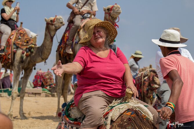 Half Day Tour To Giza Pyramids & The Great Sphinx With Camel Ride - Khufu’s Great Pyramid and the scale of Giza