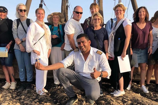 Hot Air Balloon Ride in Luxor Egypt with Transfers Included - Landing in a sugar cane field