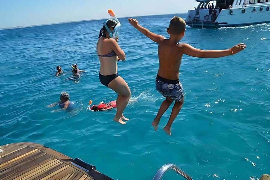 Hurghada: Dolphin Cruise with Snorkeling & Buffet Lunch - Two snorkelling stops at coral reefs