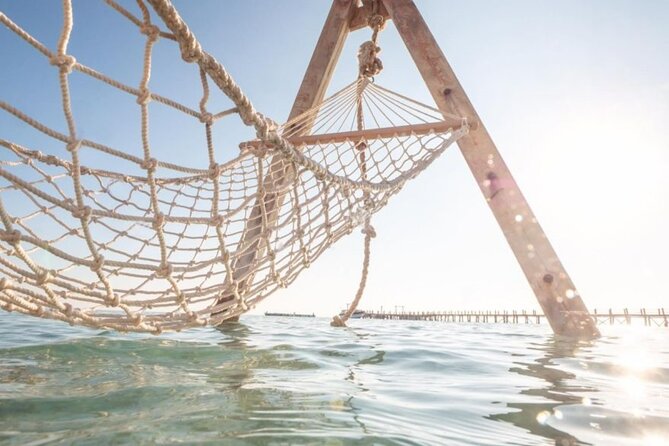 Hurghada: Orange Bay, Snorkeling, Watersports, Lunch & Drinks - Breakfast, drinks, and the day’s rhythm