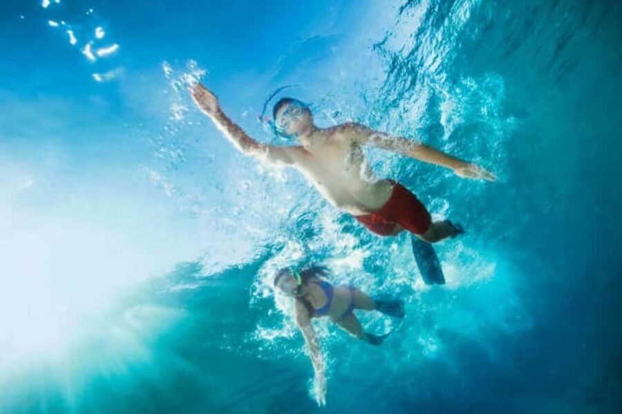 Hurghada: Orange Island Yacht Trip with Lunch & Water Sports - Guides, languages, and the group setup