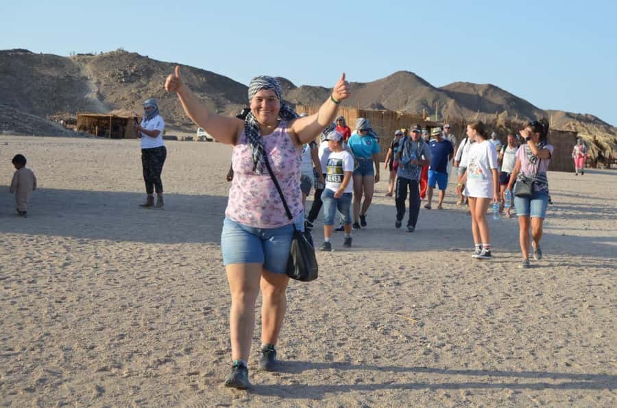Hurghada: Quad Bike and Camel Ride with Dinner and Show - Riding in a guided line across the sand