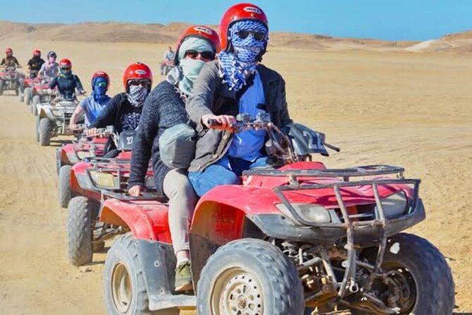 Hurghada Safari Quad and Camel Ride with Night Show and Dinner - Tanoura, belly dance, and a fire performance