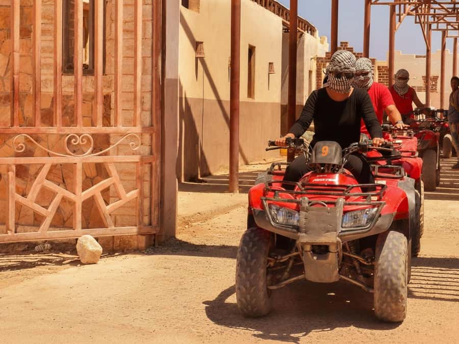 Hurghada: Sunset Quad Bike, Camel w/ Opt Stargazing and BBQ - Riding into the Hurghada desert