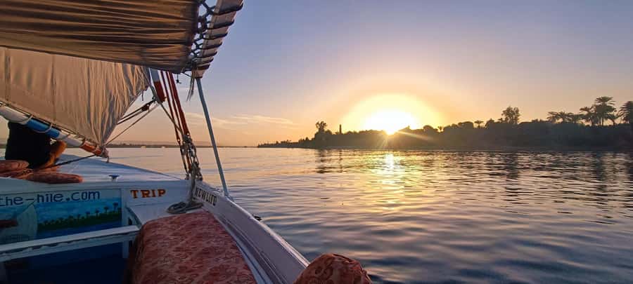 Luxor: Nile River Private Sunset Felucca Ride - Boarding a traditional felucca at the dock