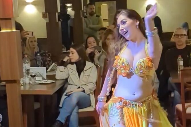 Nile Dinner Cruise in Cairo With Belly Dancing and Transfer - Belly dancing, Arabic music, and the Tanoura show