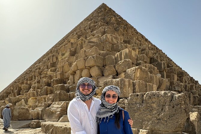 Private Giza Pyramids & Sphinx Day Tour with Lunch from Cairo - Khafre’s Pyramid still holds its cap of casing stones