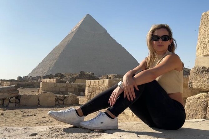 Private Guided tour to Giza Pyramids,Sphinx Camel Ride and Lunch - Taking the camel ride and finding the best photo angle