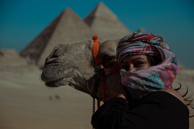 Private Half-Day Tour: Giza Pyramids and Sphinx by Camel - A camel ride beside the Giza pyramids