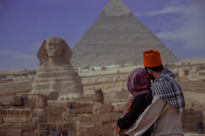Private Half-Day Tour: Giza Pyramids and Sphinx by Camel - Khafre’s Pyramid still wears part of its cap