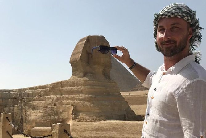 pyramids, Egyptian Museum Layover with Camel & Felucca Ride - A camel ride with the pyramids behind you