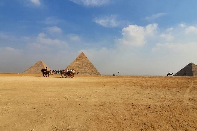 Pyramids, Memphis and Sakkara tour - Three pyramids at Giza, with the Sphinx close behind