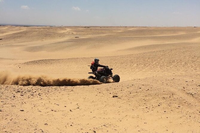 Quad Bike ATV Tours in Desert of Giza Pyramids with Egyptian Tea - Riding with the Giza Pyramids in view
