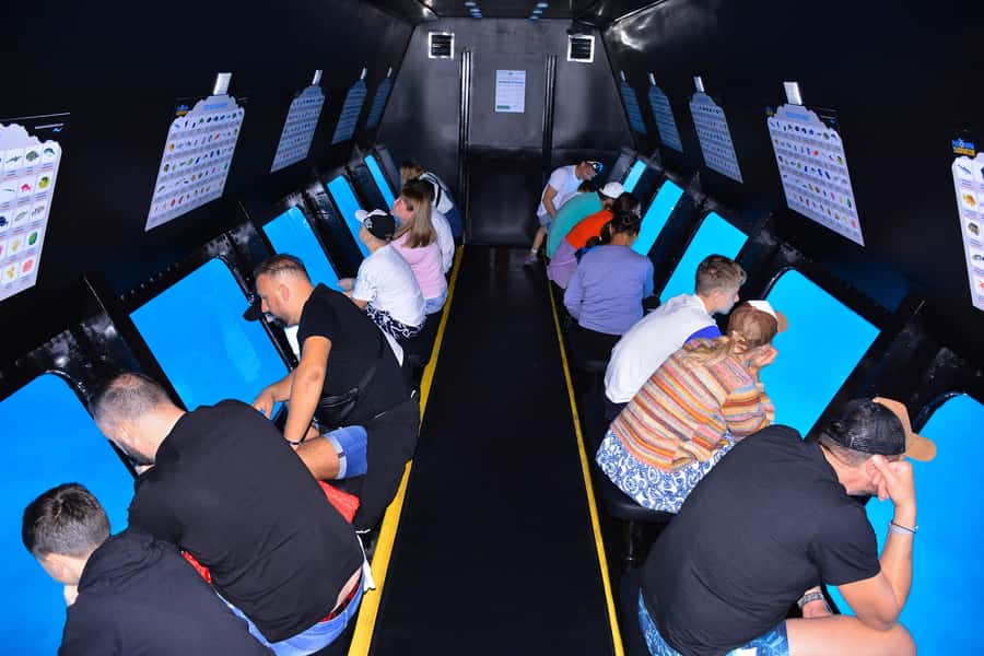 Safaga/Makadi Bay: Panorama Submarine with Snorkeling Tour - Seeing coral and fish through the lower windows
