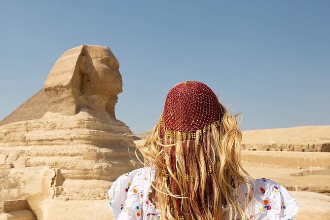 The best private inclusive half day tour at Giza pyramids . - Sphinx views and the story behind the stone