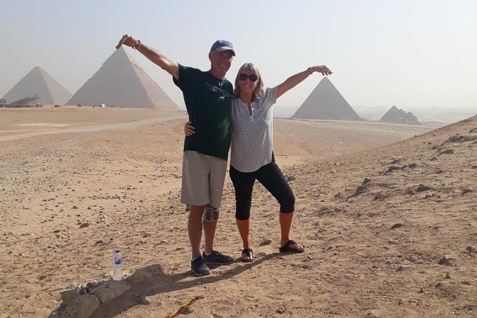 Top rated Giza Pyramids and Sphinx Tour from Cairo Airport - Lunch at a local restaurant