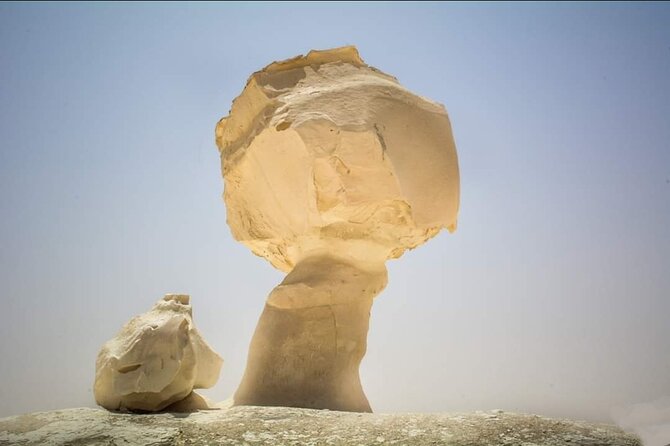 White & Black Desert tour 2 Days 1 night camping from Cairo. - Black Desert: dark hills before the pale rock